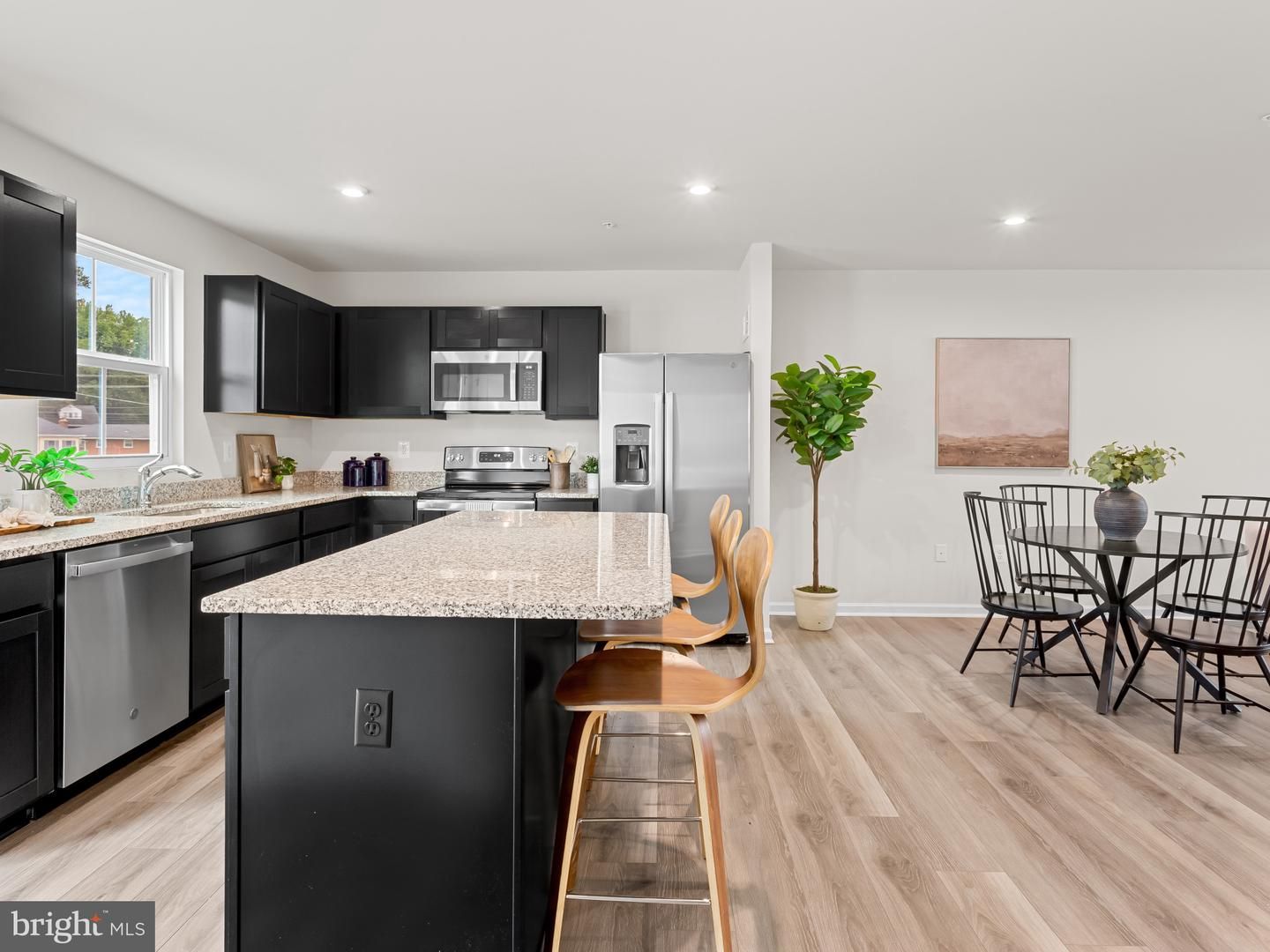 Dining room, Interior, Kitchen, Recessed Lighting, Stainless Steel Appliances, Wood Texture Flooring