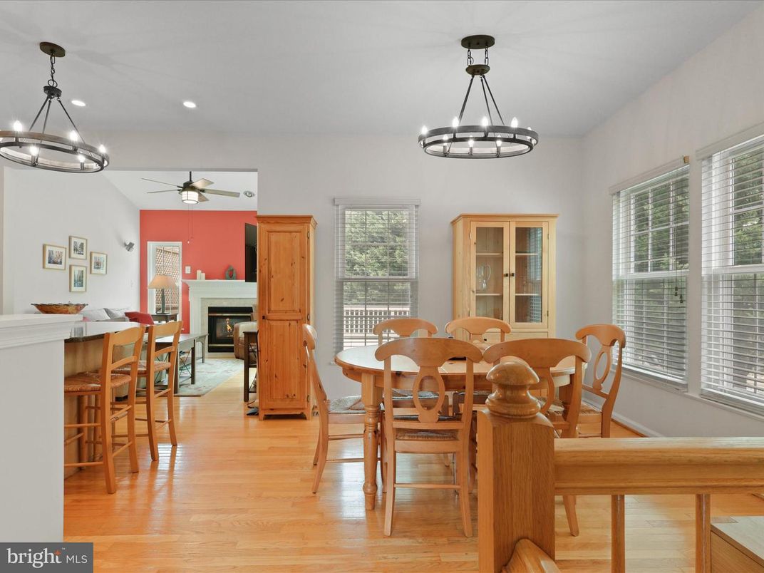 Chandelier, Dining room, Fireplace, Interior, Pendant Lights, Recessed Lighting, Wood Texture Flooring