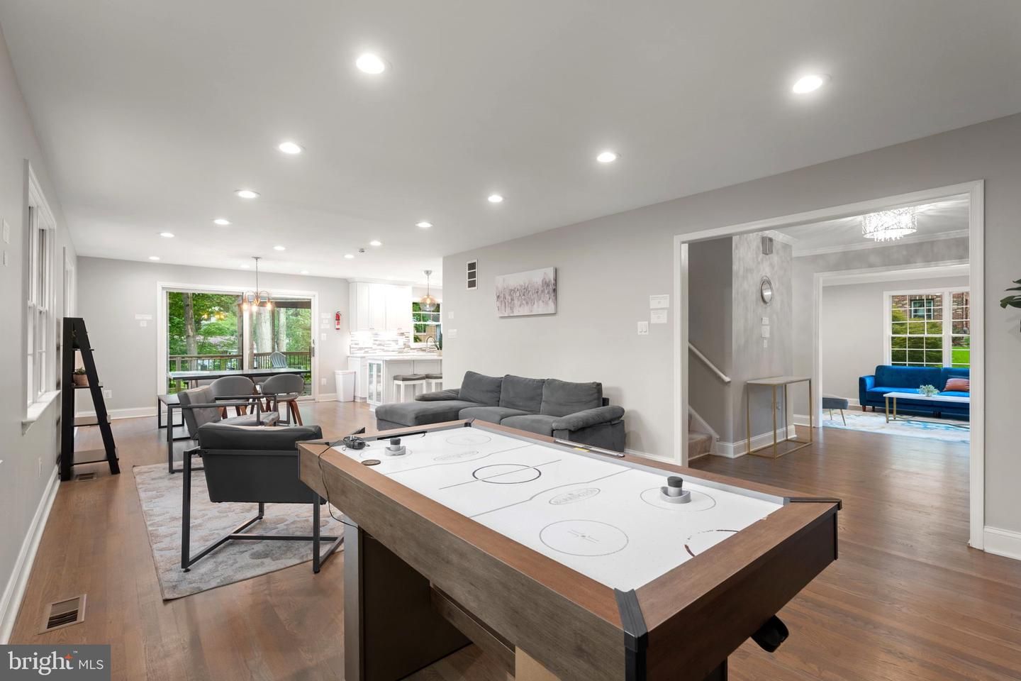 Dining room, Game Room, Interior, Living room, Pendant Lights, Recessed Lighting, Wood Texture Flooring