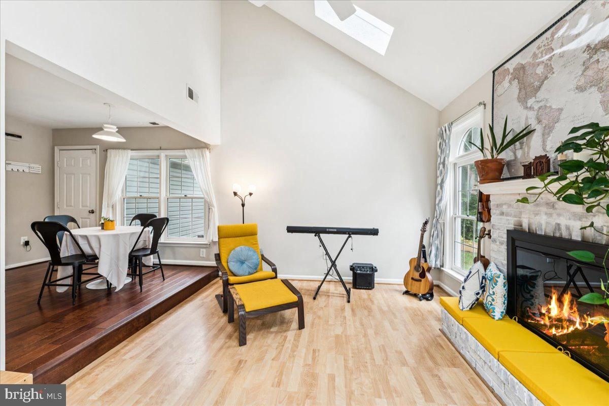 Dining room, Fireplace, Interior, Pendant Lights, Wood Texture Flooring