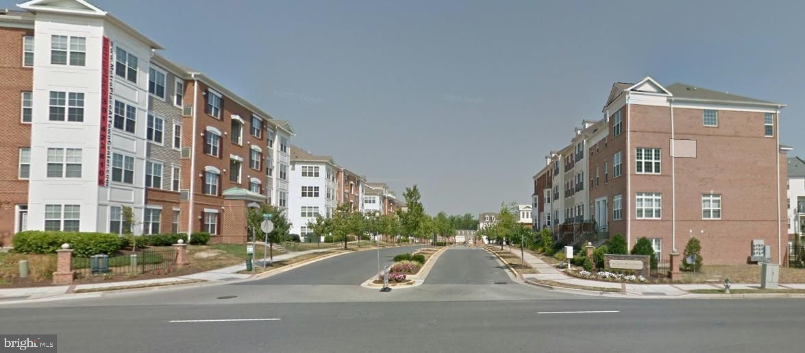 Exterior, Facade, Brick Facade, Condo Building