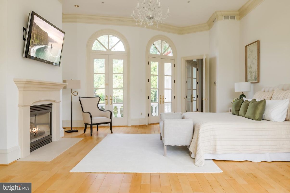 Bedroom, Chandelier, Fireplace, Interior, Recessed Lighting, Wood Texture Flooring