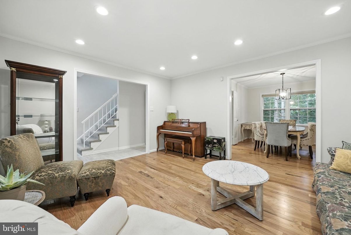 Dining room, Interior, Living room, Pendant Lights, Piano, Recessed Lighting, Wood Texture Flooring