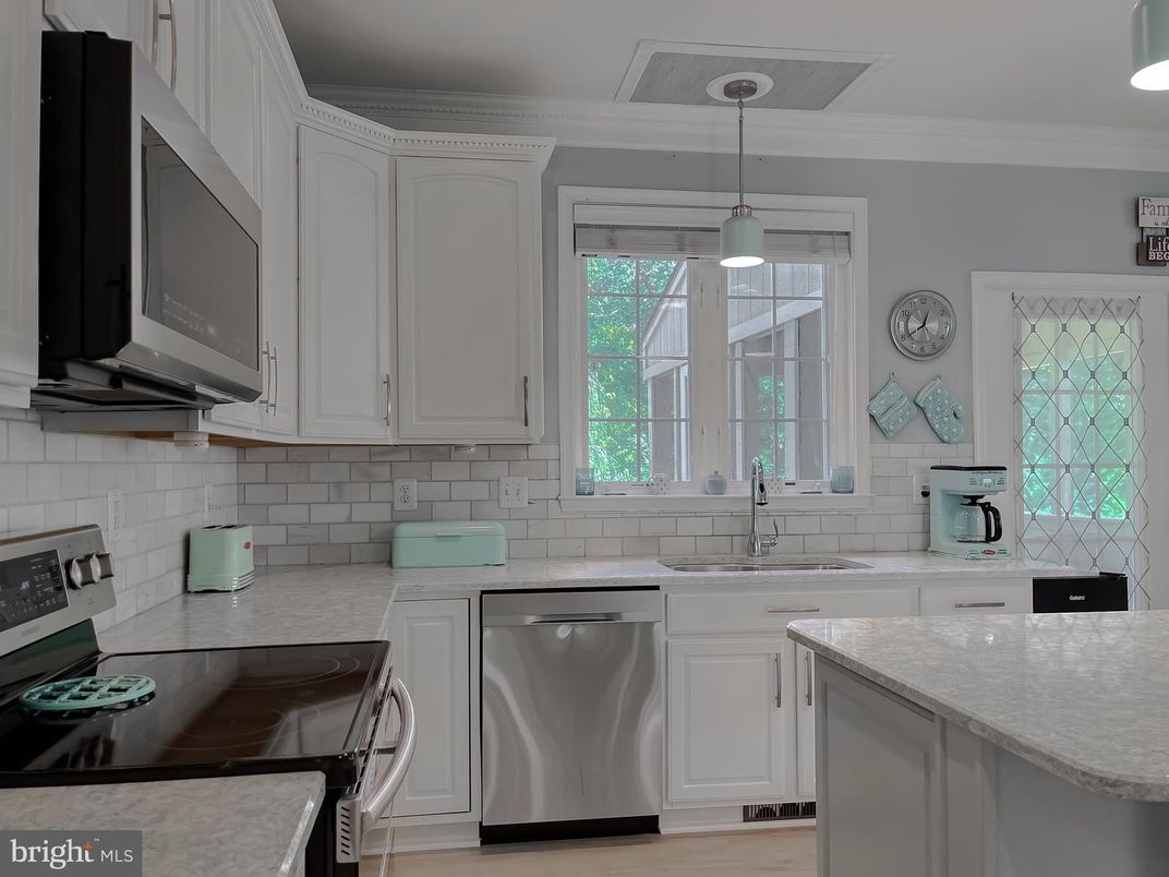 Interior, Kitchen, Pendant Lights, Stainless Steel Appliances, Wood Texture Flooring