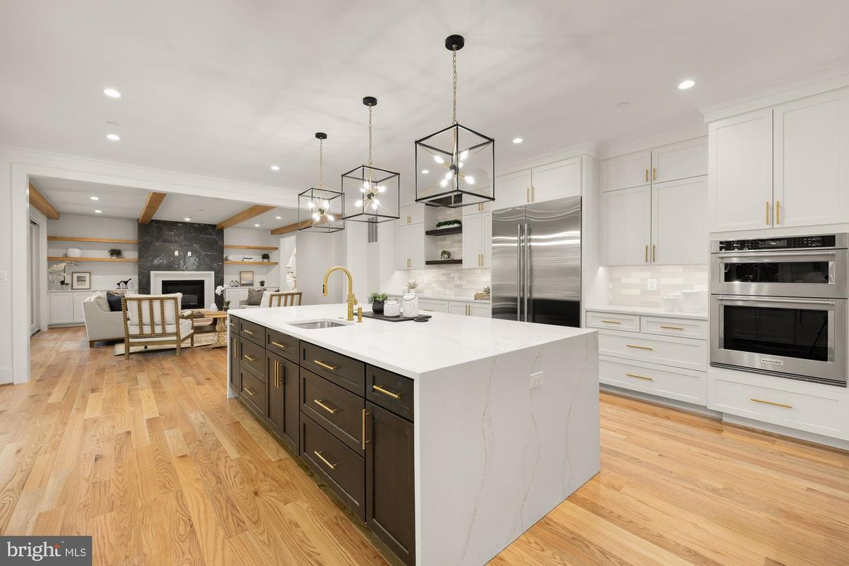 Fireplace, Interior, Kitchen, Living room, Pendant Lights, Recessed Lighting, Stainless Steel Appliances, Wood Texture Flooring