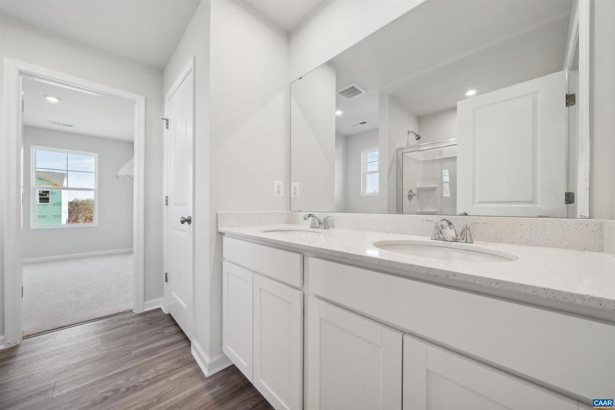Bathroom, Dual Sink Vanities, Interior, Recessed Lighting, Wood Texture Flooring