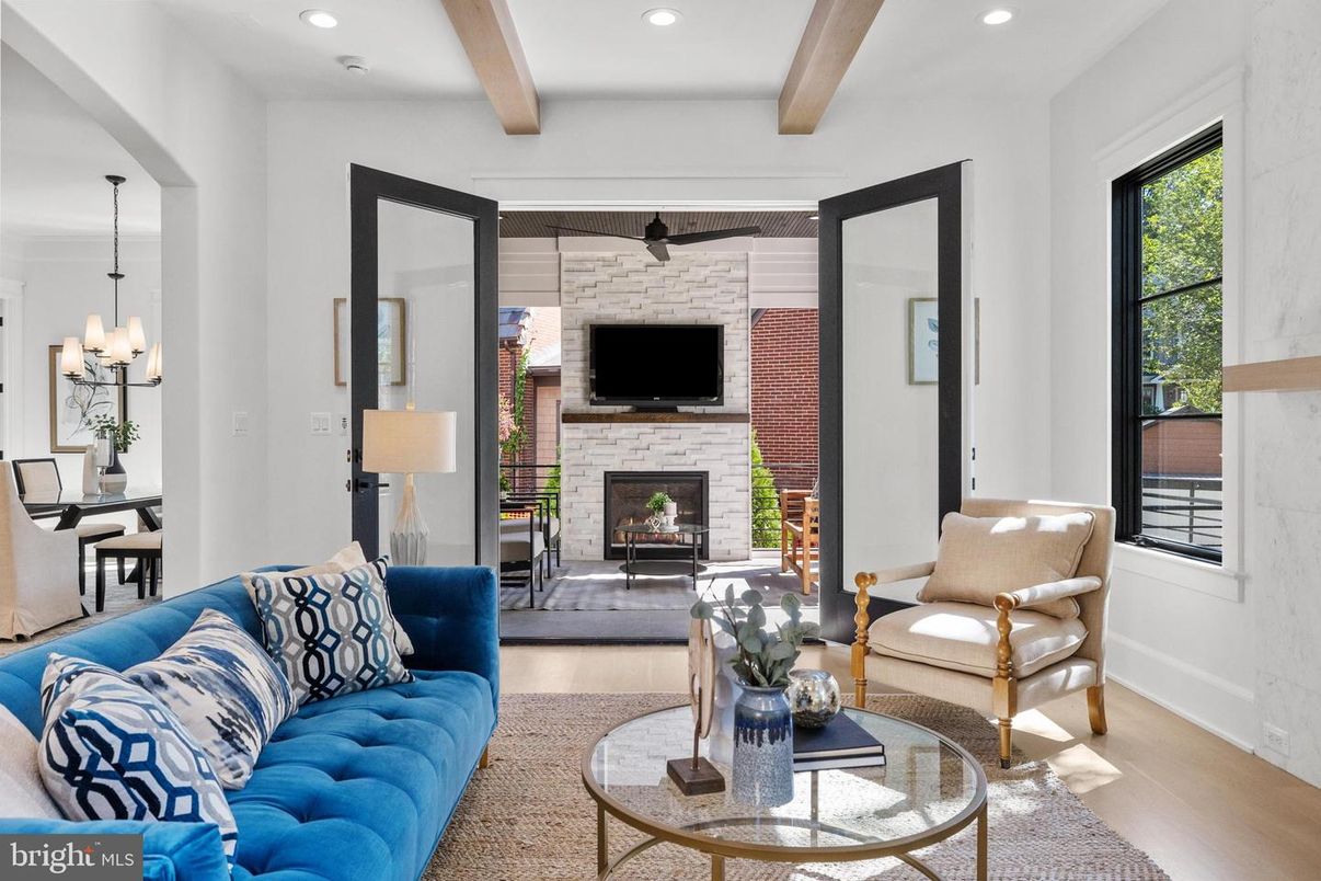 Chandelier, Dining room, Fireplace, Interior, Living room, Recessed Lighting, Stone Walls, Wooden Beams, Wood Texture Flooring