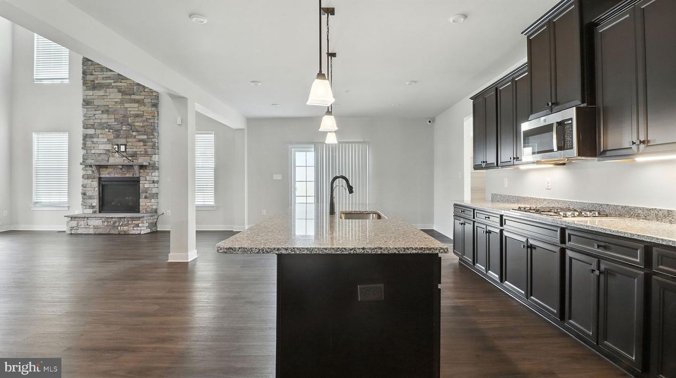 Fireplace, Interior, Kitchen, Pendant Lights, Recessed Lighting, Stone Walls, Wood Texture Flooring
