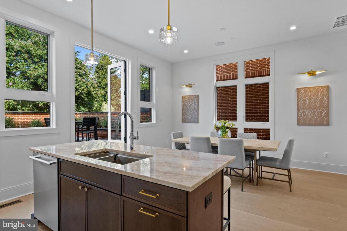 Dining room, Interior, Kitchen, Pendant Lights, Recessed Lighting, Stainless Steel Appliances, Wood Texture Flooring