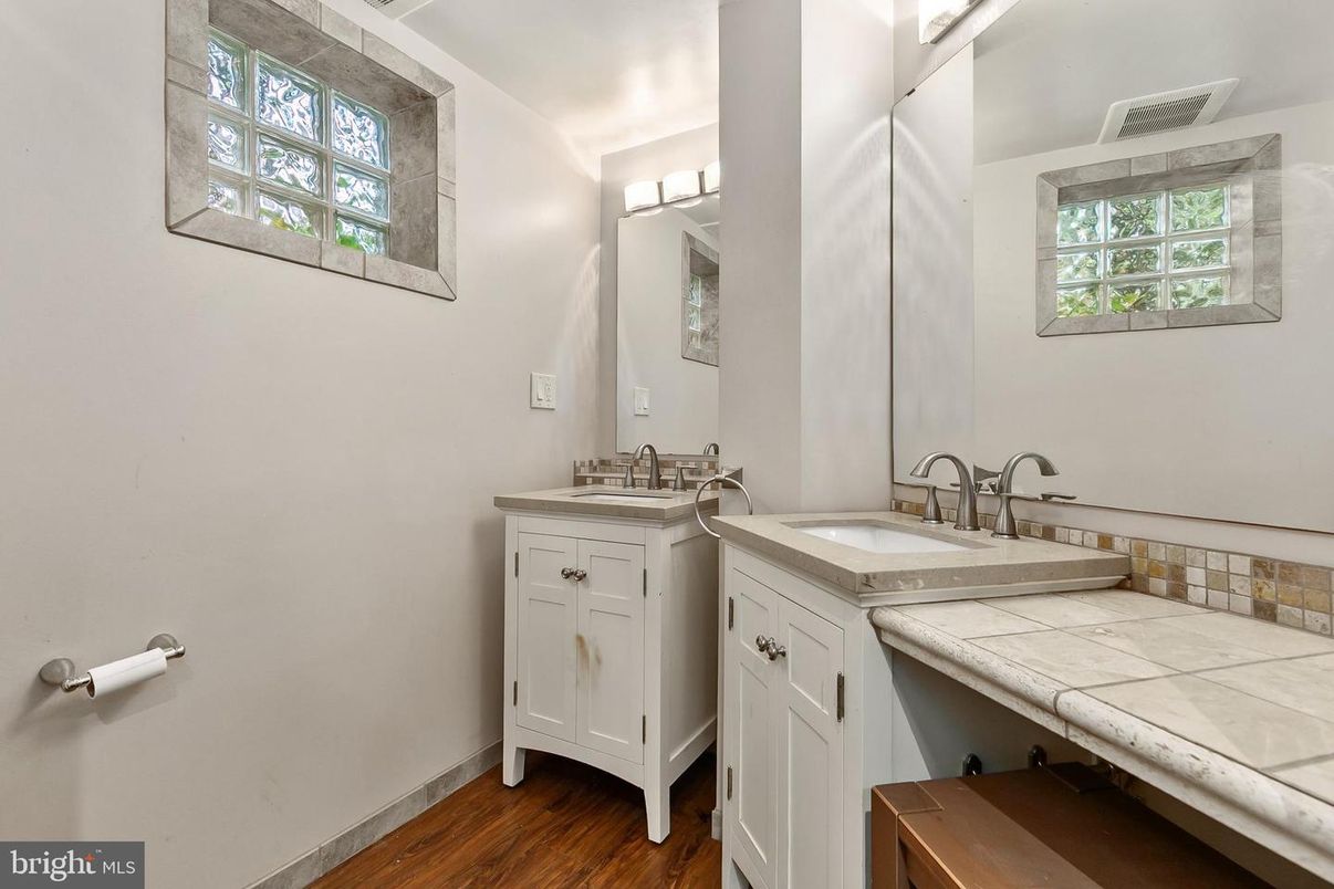 Bathroom, Dual Sink Vanities, Interior, Tile Countertops, Wood Texture Flooring