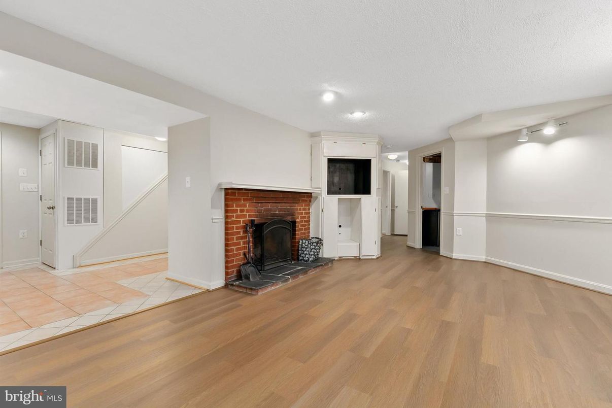 Empty room, Fireplace, Interior, Recessed Lighting, Wood Texture Flooring