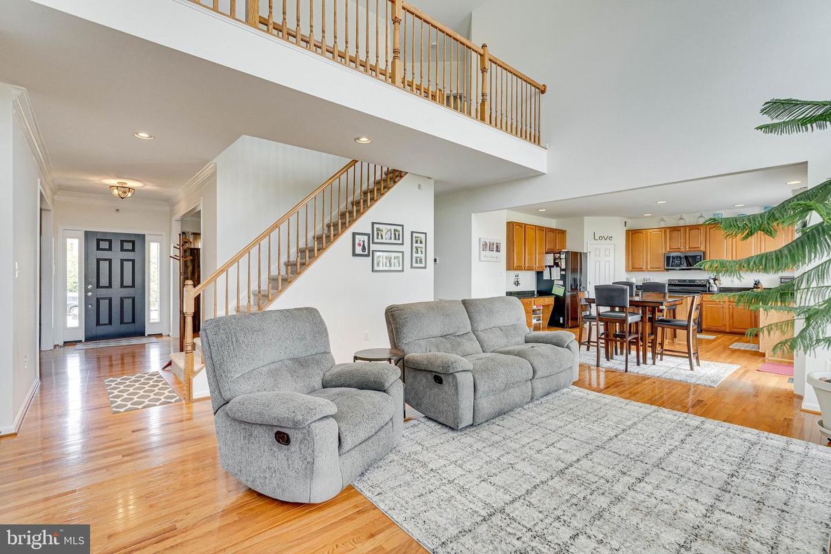 Dining room, Interior, Kitchen, Living room, Recessed Lighting, Stainless Steel Appliances, Wood Texture Flooring