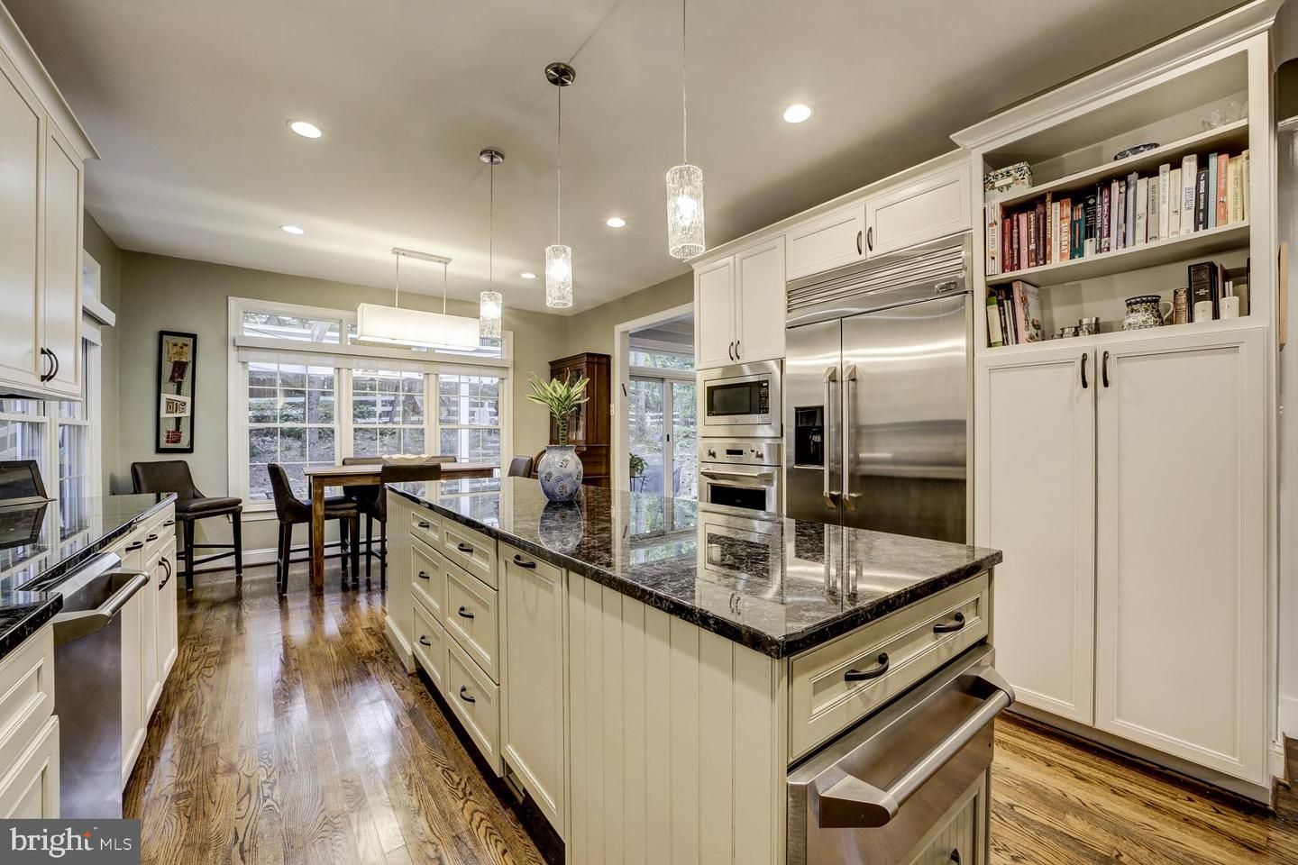 Dining room, Interior, Kitchen, Pendant Lights, Recessed Lighting, Stainless Steel Appliances, Wood Texture Flooring