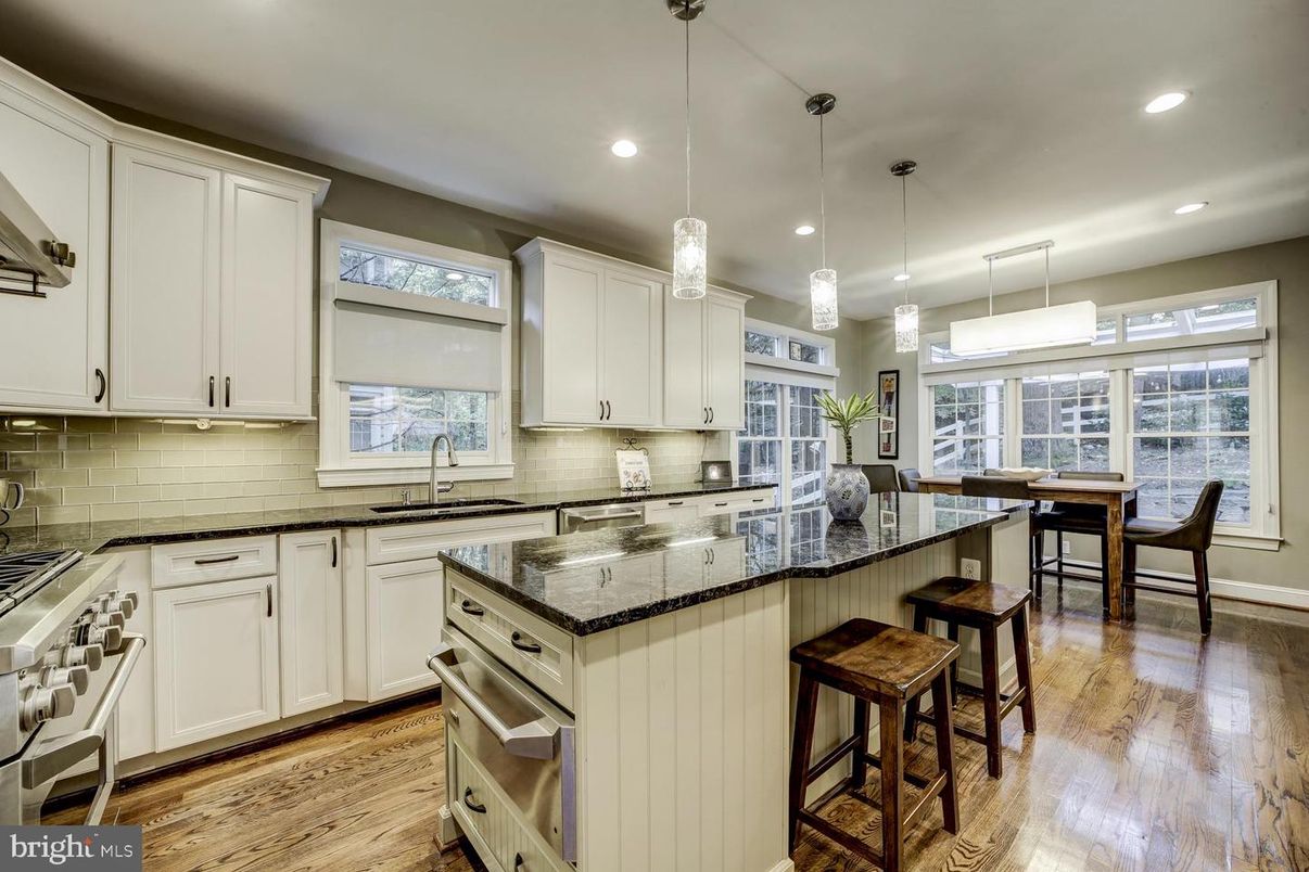 Dining room, Interior, Kitchen, Pendant Lights, Recessed Lighting, Stainless Steel Appliances, Wood Texture Flooring