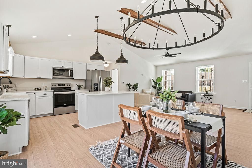 Dining room, Interior, Kitchen, Pendant Lights, Recessed Lighting, Stainless Steel Appliances, Wood Texture Flooring