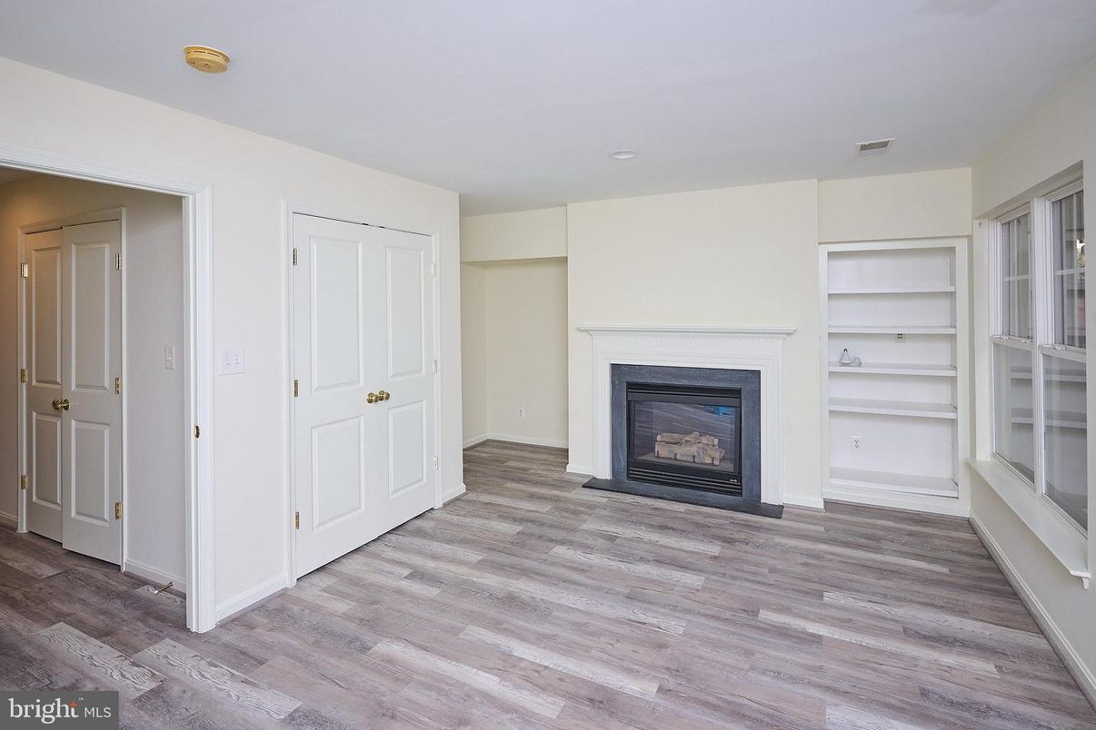 Empty room, Fireplace, Interior, Recessed Lighting, Wood Texture Flooring