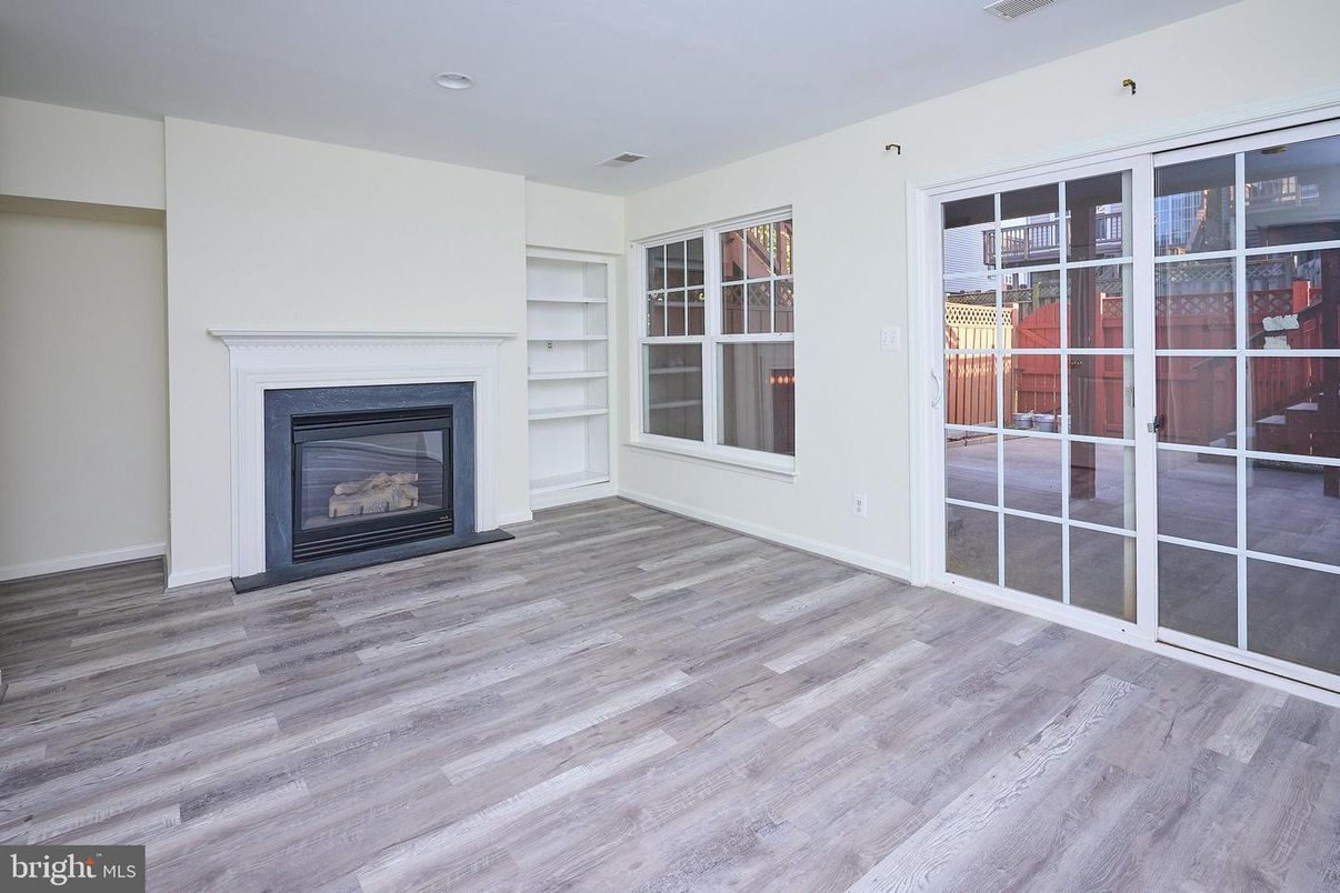 Empty room, Fireplace, Interior, Recessed Lighting, Wood Texture Flooring