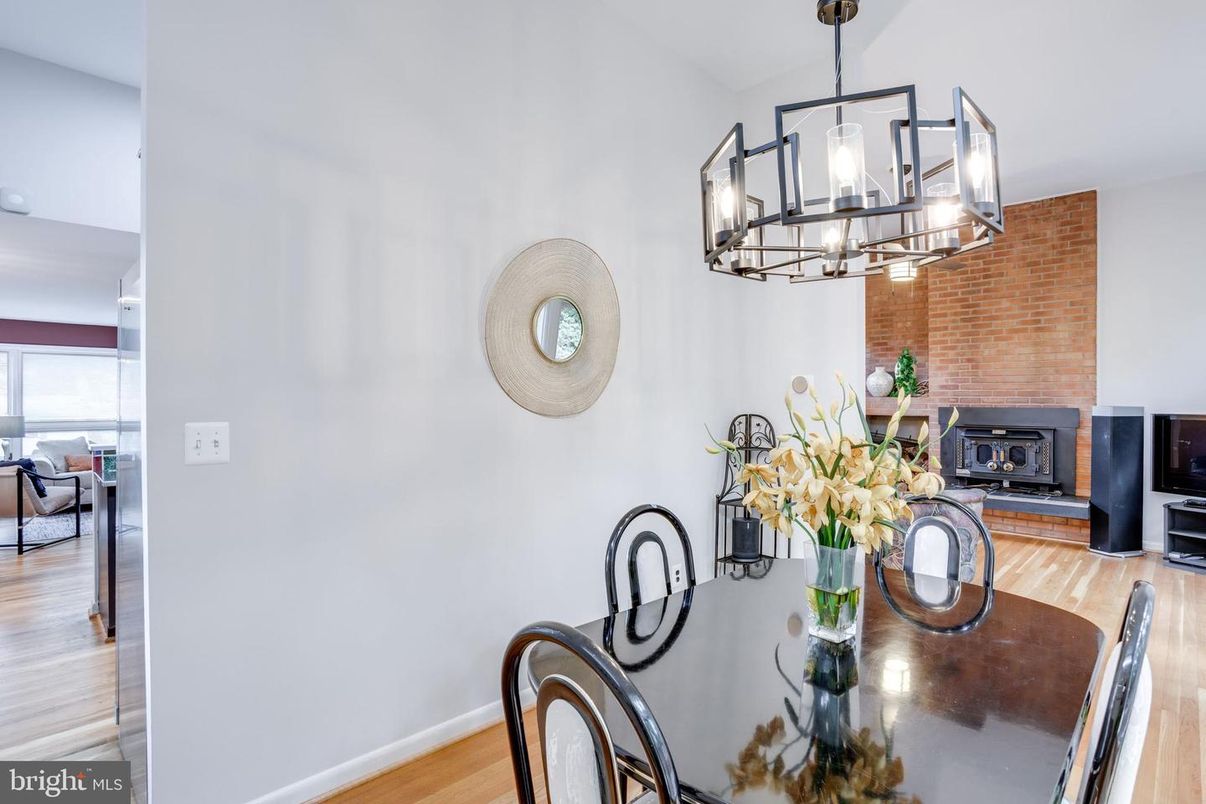 Dining room, Fireplace, Interior, Pendant Lights, Stone Walls, Wood Texture Flooring