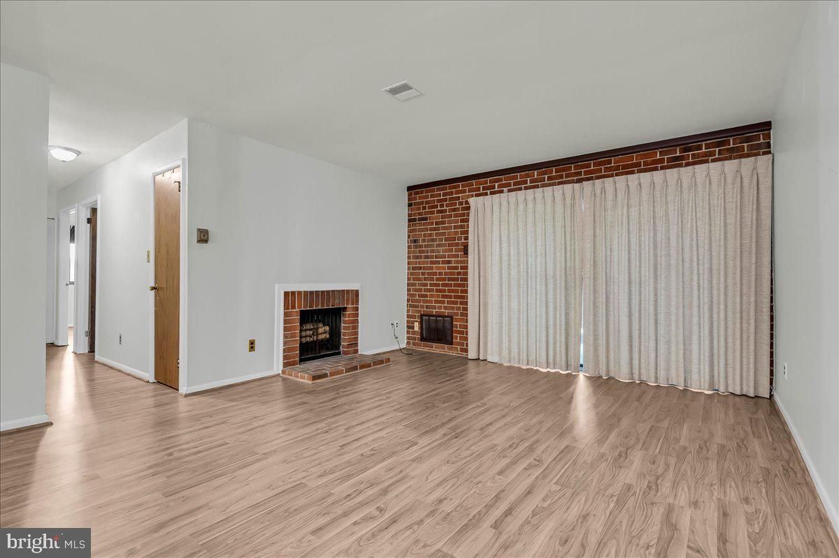 Empty room, Fireplace, Interior, Stone Walls, Wood Texture Flooring