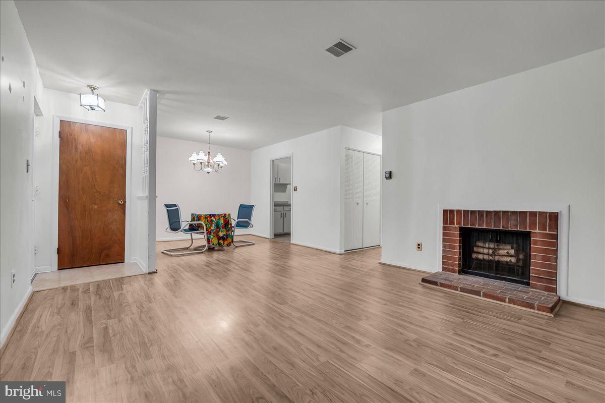 Chandelier, Dining room, Fireplace, Interior, Wood Texture Flooring