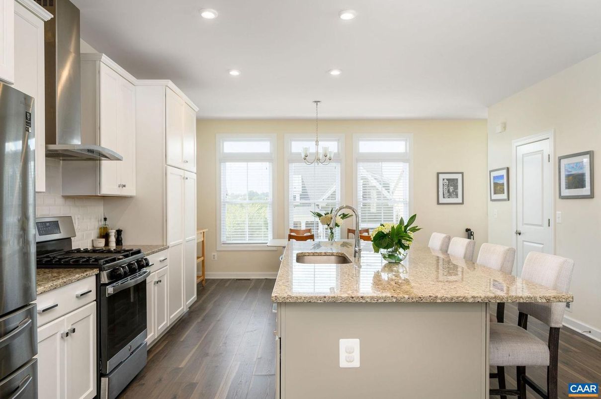 Chandelier, Dining room, Interior, Kitchen, Recessed Lighting, Stainless Steel Appliances, Wood Texture Flooring