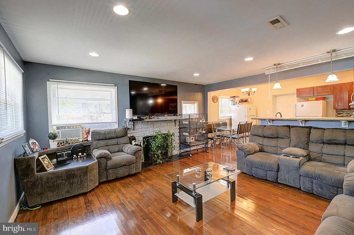 Chandelier, Dining room, Fireplace, Interior, Kitchen, Living room, Pendant Lights, Recessed Lighting, Wood Texture Flooring