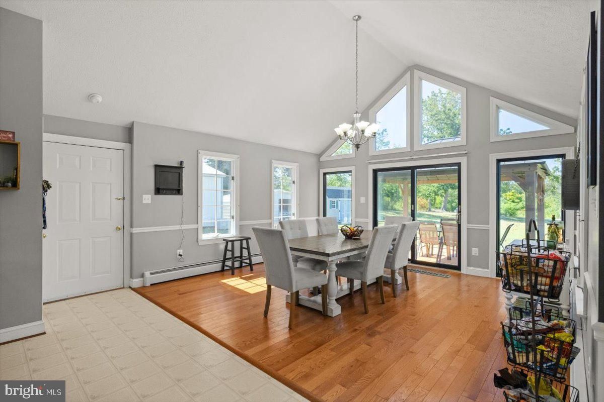 Chandelier, Dining room, Interior, Wood Texture Flooring