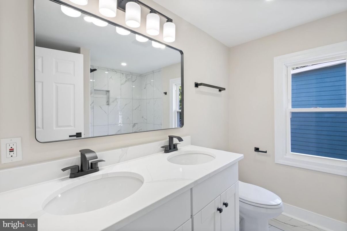 Bathroom, Dual Sink Vanities, Glass Shower, Interior, Marble Walls, Recessed Lighting