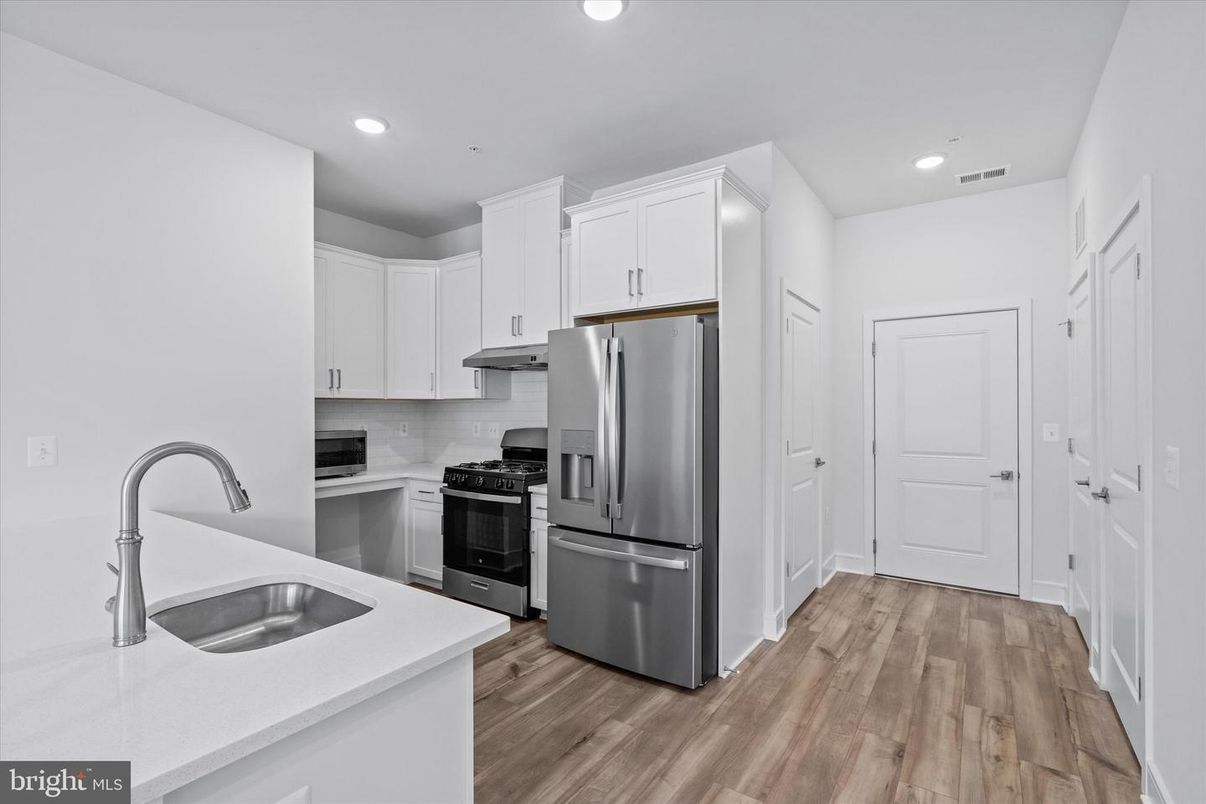 Interior, Kitchen, Recessed Lighting, Stainless Steel Appliances, Wood Texture Flooring
