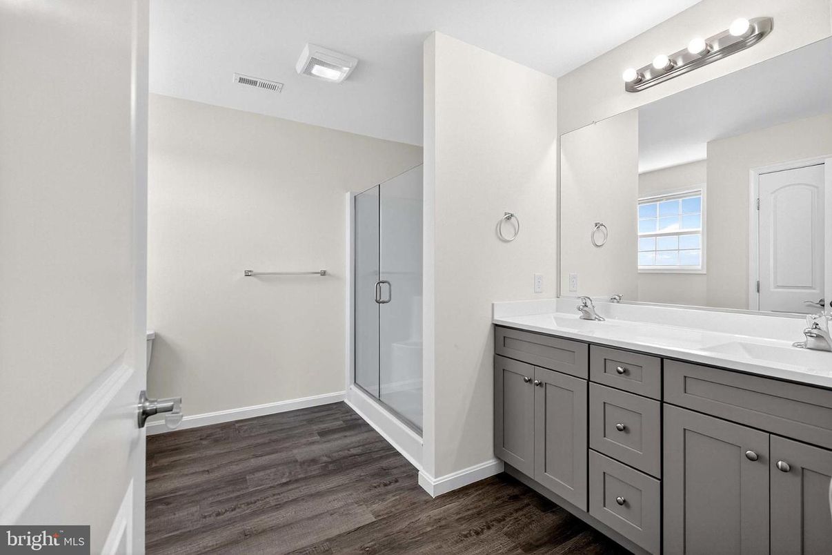 Bathroom, Dual Sink Vanities, Glass Shower, Interior, Wood Texture Flooring