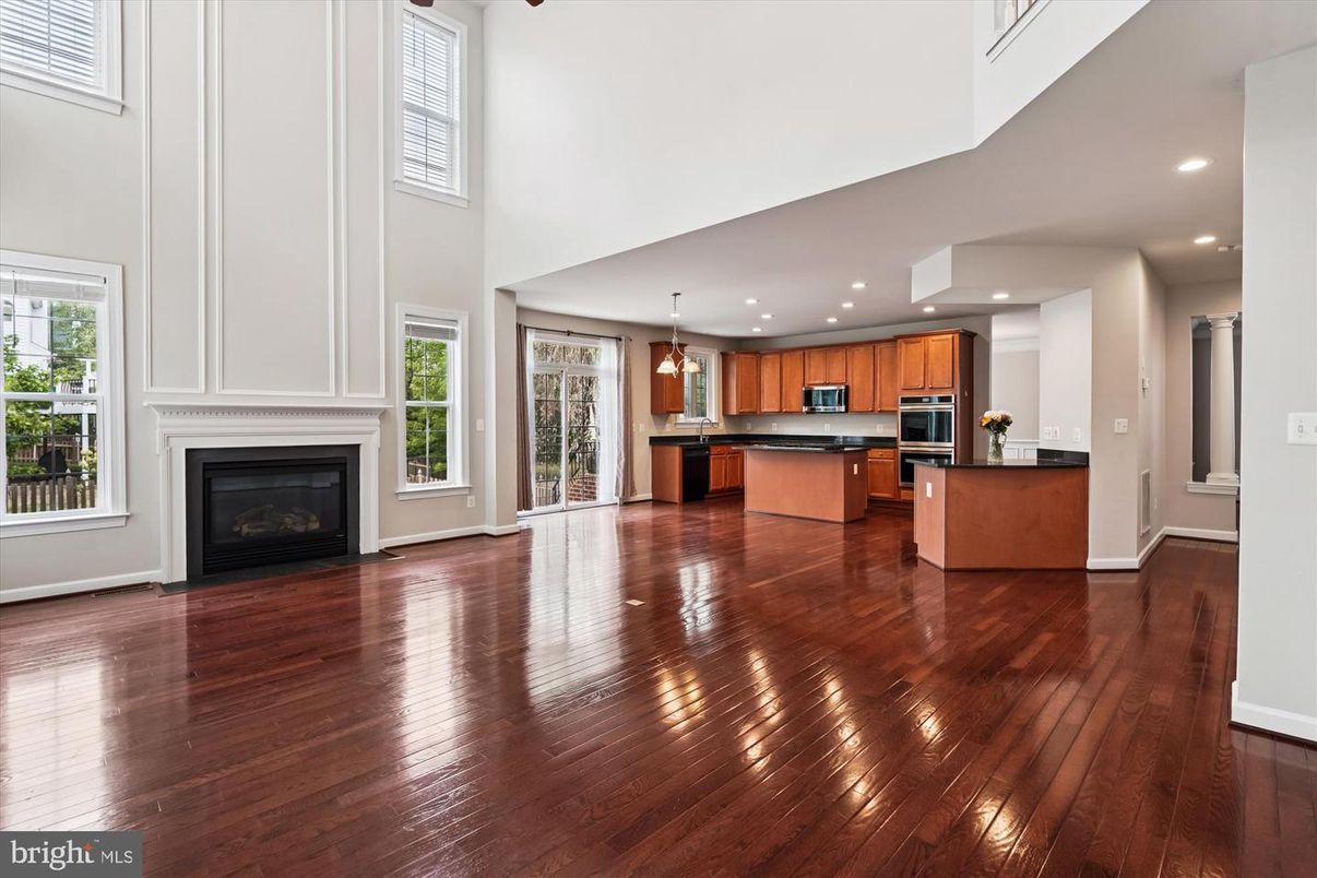 Fireplace, Interior, Kitchen, Pendant Lights, Recessed Lighting, Stainless Steel Appliances, Wood Texture Flooring