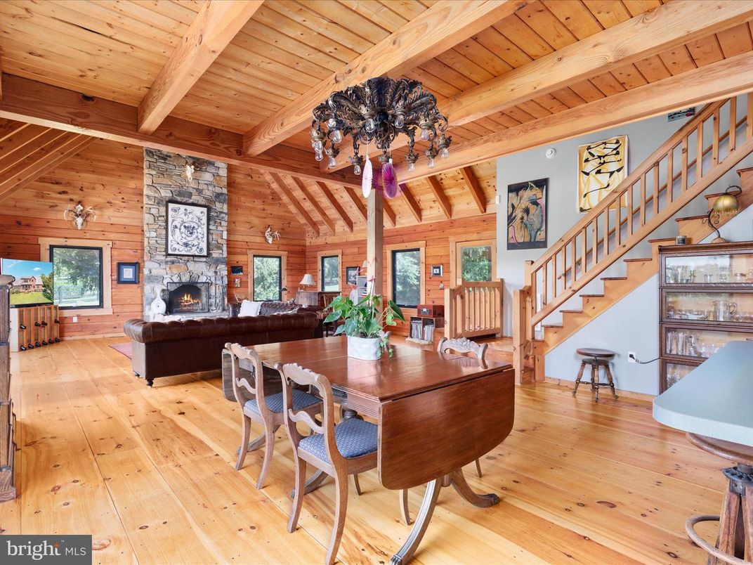 Chandelier, Dining room, Fireplace, Interior, Living room, Wooden Beams, Wooden Ceilings, Wood Texture Flooring, Wooden Walls