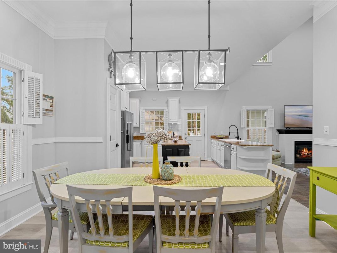 Dining room, Fireplace, Interior, Kitchen, Pendant Lights, Wood Texture Flooring