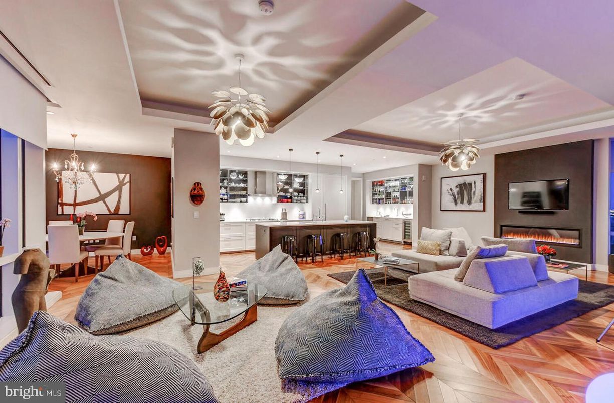 Chandelier, Dining room, Fireplace, Interior, Living room, Pendant Lights, Recessed Lighting, Wood Texture Flooring