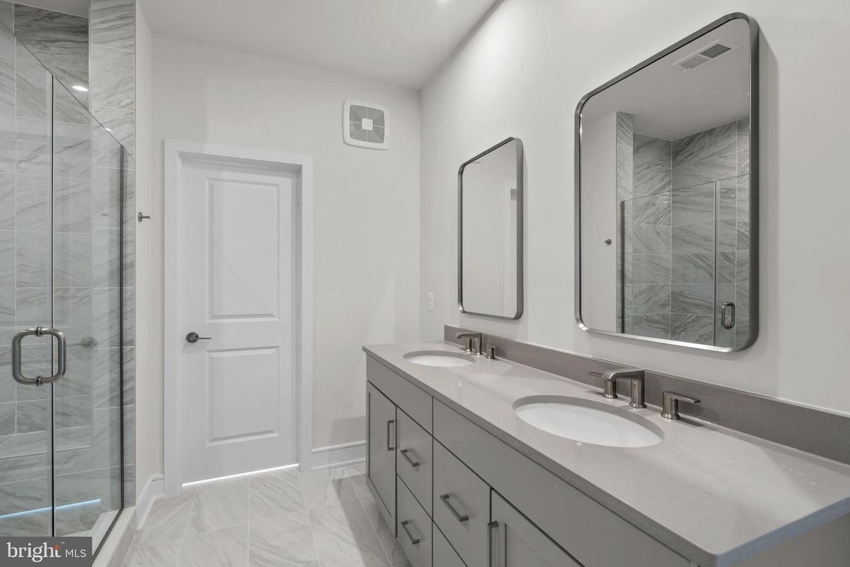 Bathroom, Dual Sink Vanities, Glass Shower, Interior, Marble, Marble Walls, Recessed Lighting