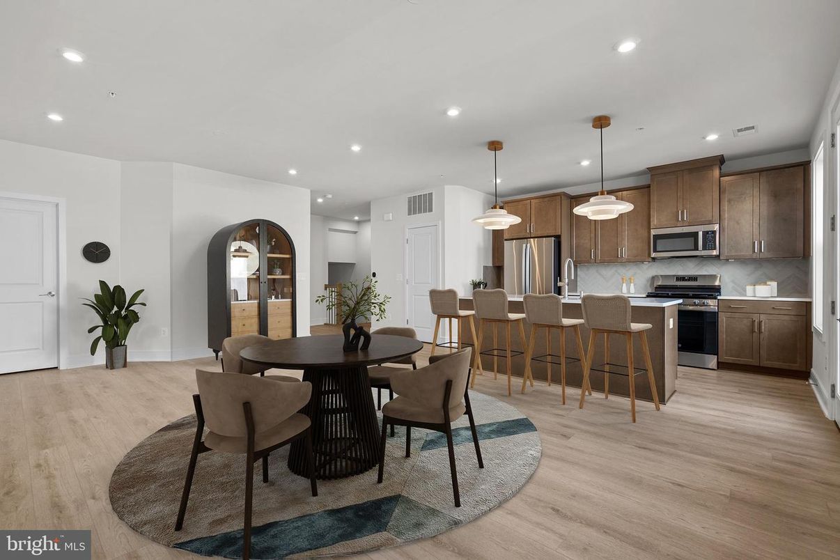Dining room, Interior, Kitchen, Pendant Lights, Recessed Lighting, Stainless Steel Appliances, Wood Texture Flooring