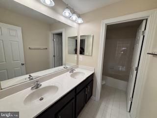 Bathroom, Dual Sink Vanities, Glass Shower, Interior, Wood Texture Flooring