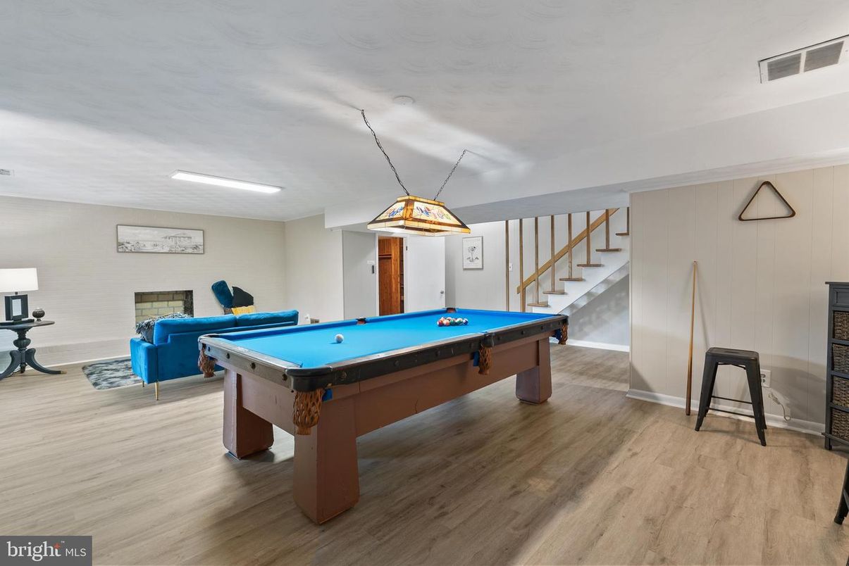 Billiard Table, Fireplace, Game Room, Interior, Pendant Lights, Recessed Lighting, Wood Texture Flooring