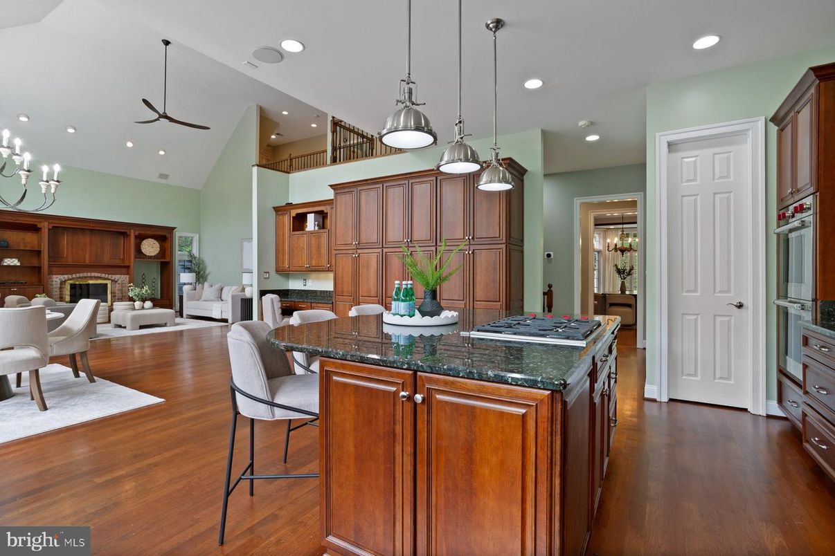 Chandelier, Dining room, Fireplace, Interior, Kitchen, Living room, Pendant Lights, Recessed Lighting, Wood Texture Flooring