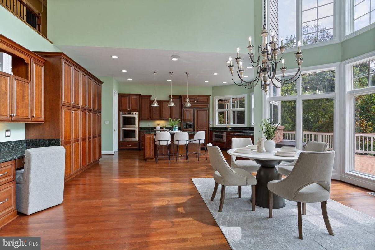 Chandelier, Dining room, Interior, Kitchen, Pendant Lights, Recessed Lighting, Stainless Steel Appliances, Wood Texture Flooring