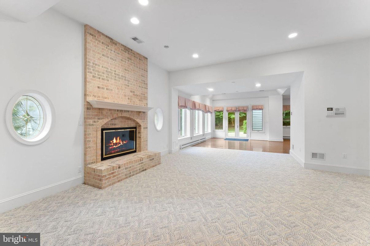 Fireplace, Interior, Recessed Lighting, Stone Walls, Wood Texture Flooring