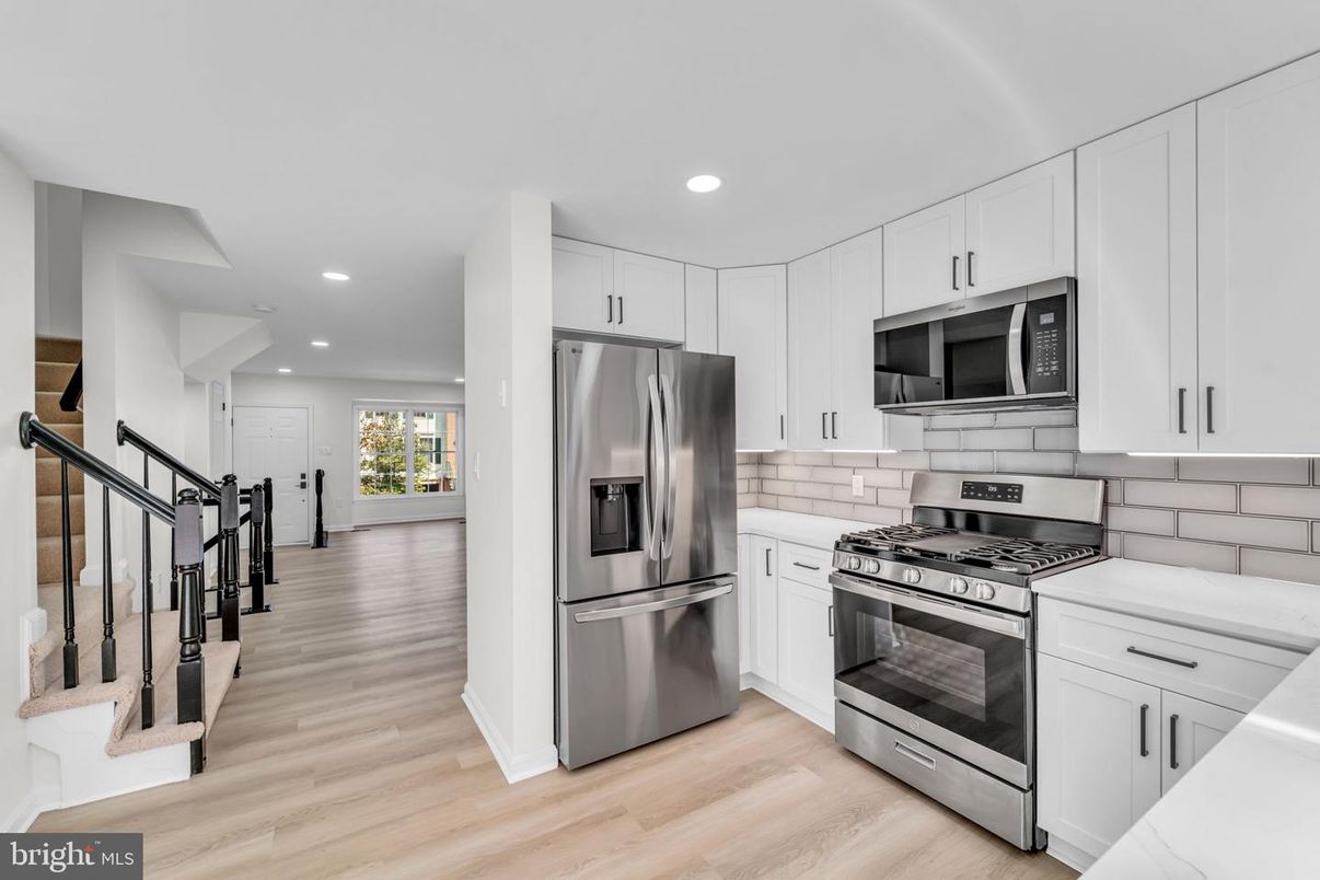 Interior, Kitchen, Recessed Lighting, Stainless Steel Appliances, Wood Texture Flooring