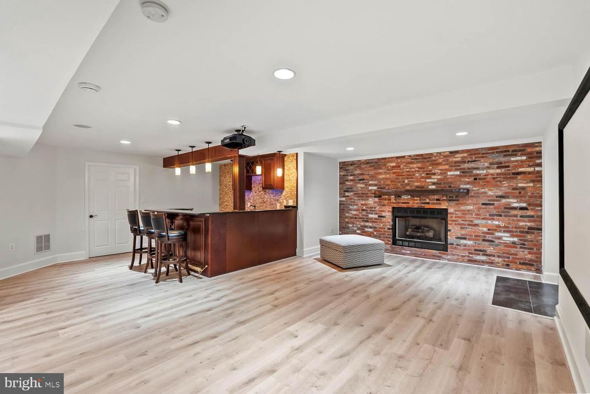 Fireplace, Interior, Recessed Lighting, Stone Walls, Wood Texture Flooring