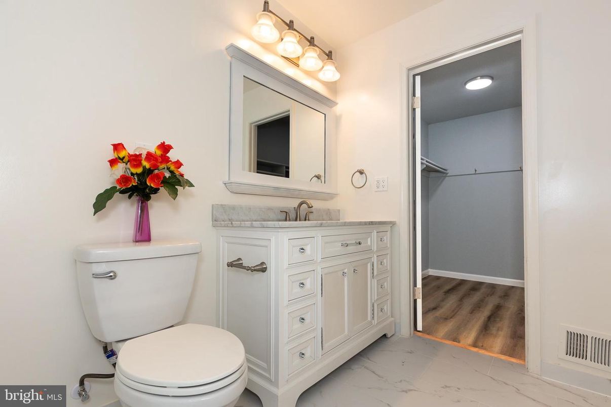 Bathroom, Dual Sink Vanities, Interior, Marble, Walk-in Closets, Wood Texture Flooring