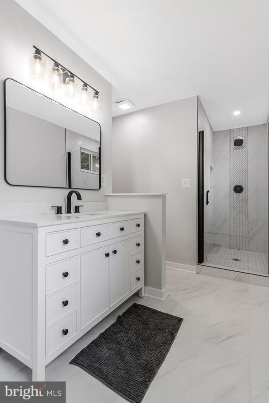 Bathroom, Dual Sink Vanities, Glass Shower, Interior, Marble, Recessed Lighting