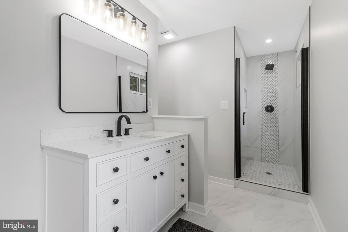 Bathroom, Dual Sink Vanities, Glass Shower, Interior, Marble, Recessed Lighting