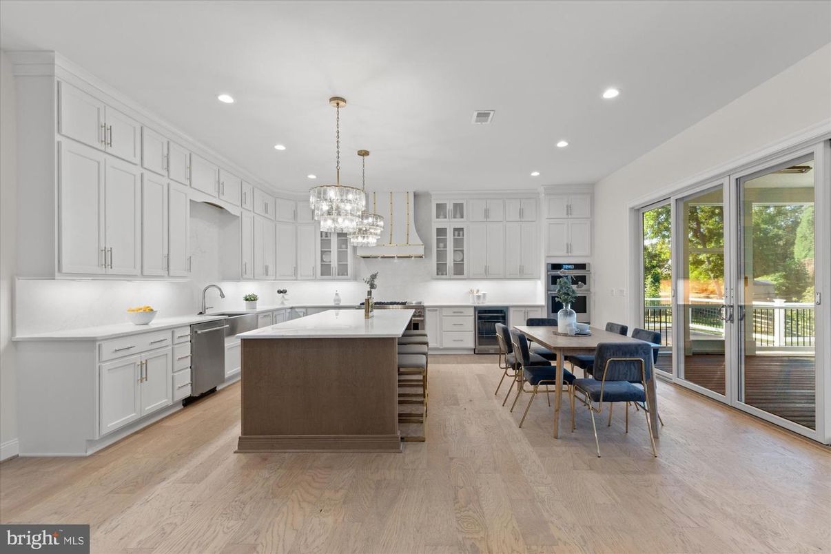 Chandelier, Dining room, Interior, Kitchen, Recessed Lighting, Stainless Steel Appliances, Wood Texture Flooring