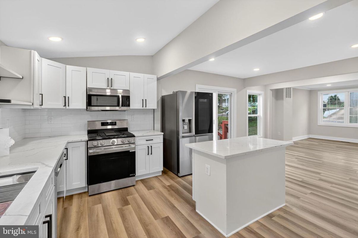 Interior, Kitchen, Recessed Lighting, Stainless Steel Appliances, Wood Texture Flooring