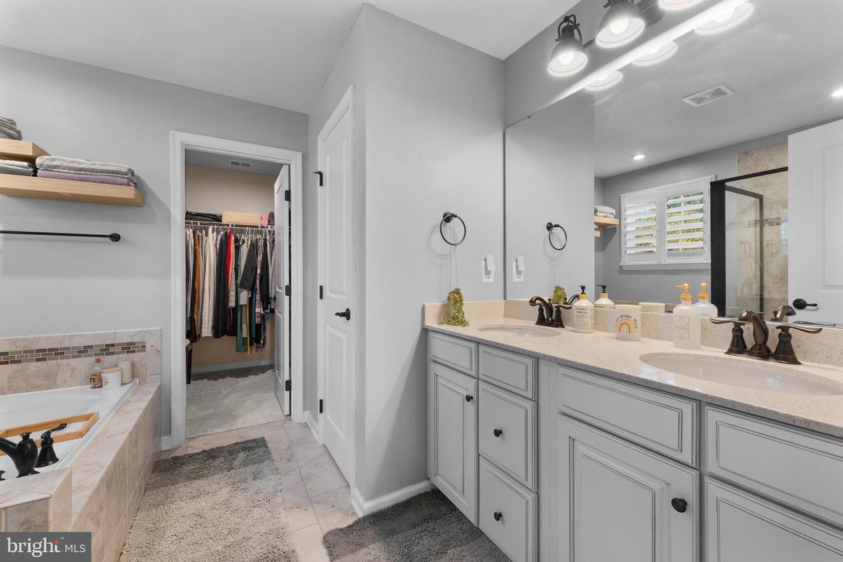 Bathroom, Dual Sink Vanities, Interior, Recessed Lighting, Walk-in Closets