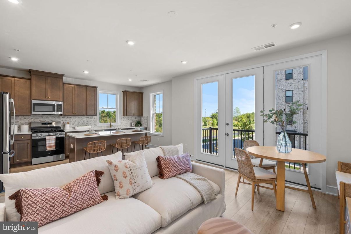 Dining room, Interior, Kitchen, Living room, Recessed Lighting, Stainless Steel Appliances, Wood Texture Flooring